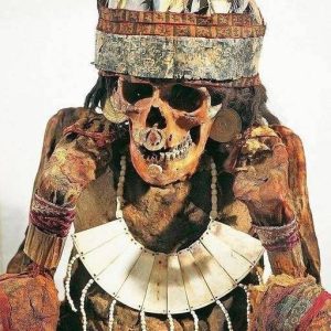 Ancient Woman's Mummy from Necropolis: Adorned with Gold and Bone Jewelry, and a Feather Headdress, Dating Back to Circa 200 B.C. - NEWS
